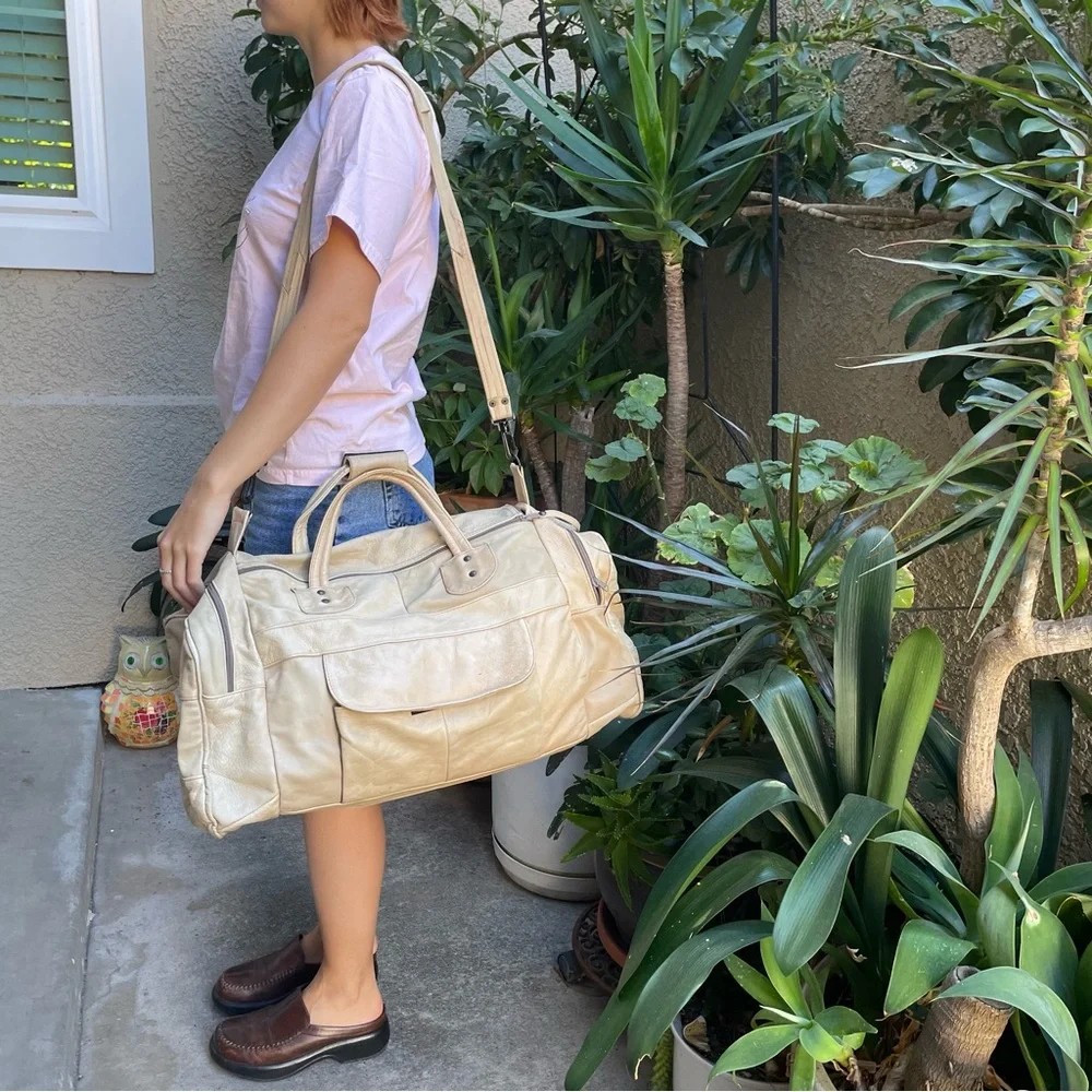 Vintage cream leather travel bag